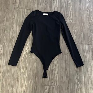 Babaton from Aritzia contour crew long sleeve bodysuit in black. Size XS